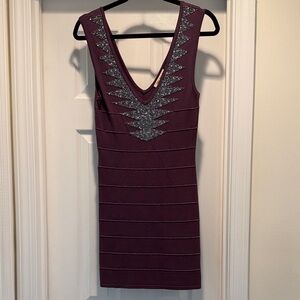 Elegant Purple Sleeveless Dress with Silver Accents